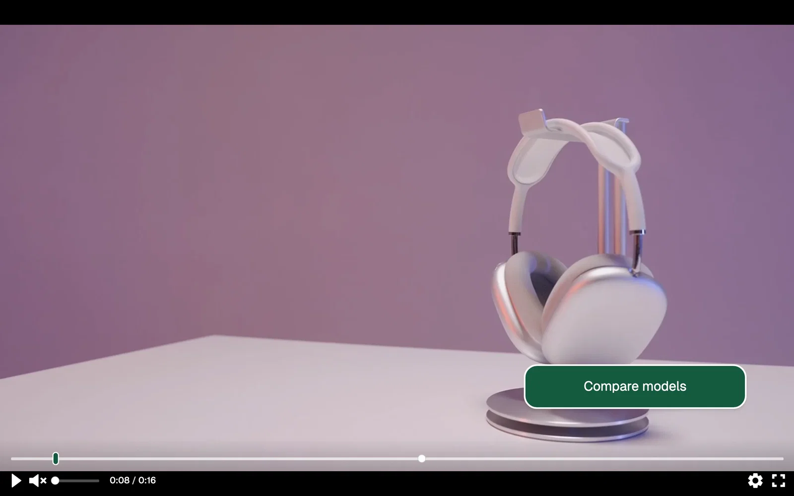 A headphones product video with a Compare models button in the lower right corner