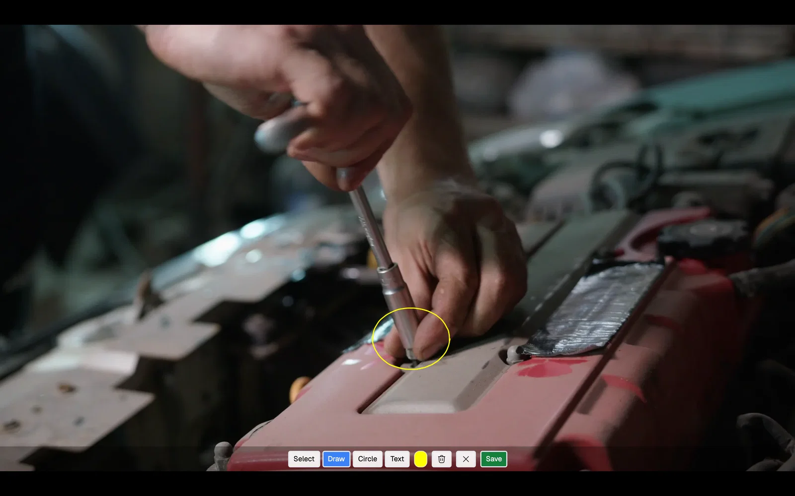 A viewer has circled part of an engine on a paused video frame, with drawing tools and a Save button